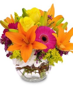 bright colorful bouquet of orange, magenta, and yellow flowers