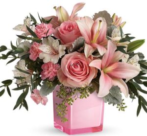 pink roses and lilies in cubed vase