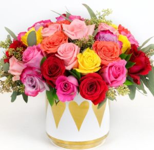 this beautiful bouquet created with our finest premium imported roses from Ecuador. The roses come designed in a keepsake ceramic container with golden heart embellishments. 